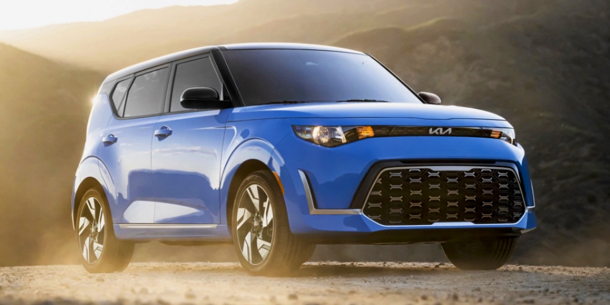 A blue 2023 Kia Soul subcompact SUV is parked.