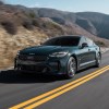 Kia sales indicate that the Kia Stinger, pictured in gray driving on a dry road, is at the bottom of Kia sales.