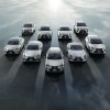 An overhead shot army of white Lexus NX SUVs against a cloudy backdrop. Lexus SUV sales are percolating lately