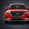 A red Mazda CX-9 midsize SUV.