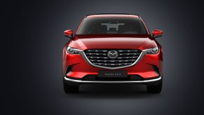 A red Mazda CX-9 midsize SUV.