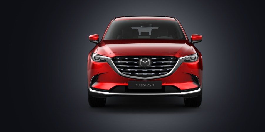 A red Mazda CX-9 midsize SUV.