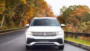 The front grille of a white Volkswagen Tiguan, one of the most popular Volkswagen models available.