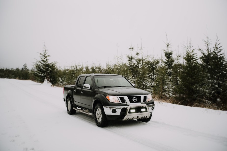 A first-gen Nissan Frontier used pickup truck worth $25k or less.