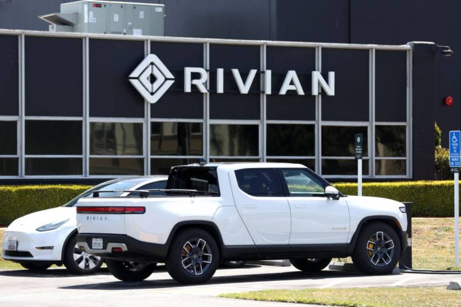 A white R1T parked outside a Rivian office