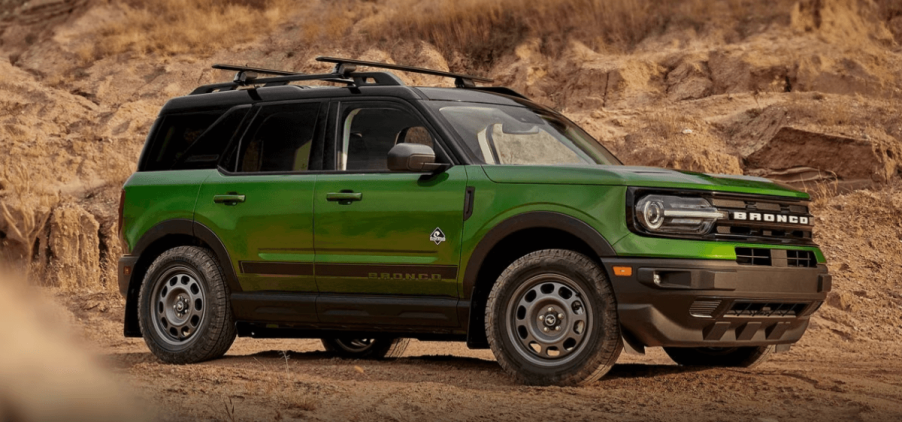 A 2024 Ford Bronco Sport with the Black Diamond Off-Road Package compact SUV model parked on dirt and sand