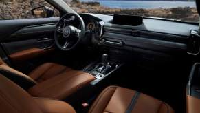 Luxurious features in cars include memory seats, like the driver's seat in the 2024 Mazda CX-50