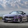 A BMW Z4 M40i performance-focused sports car coupe model parked on a gravel/sand plain