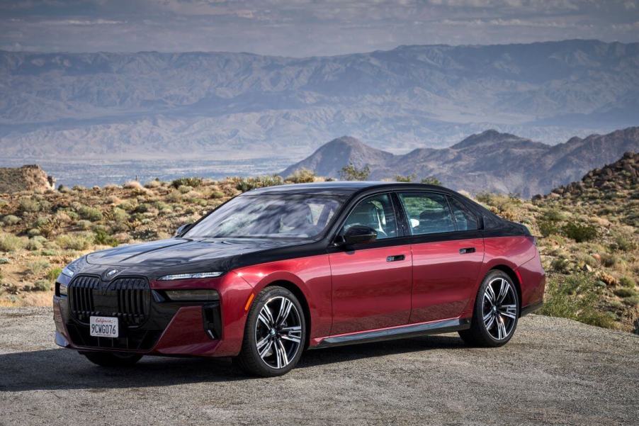 The new BMW 7 Series 760i xDrive full-size luxury sedan model in two-tone Aventurin Red Metallic