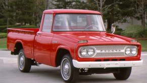 A 1965 Toyota Stout model driving down the road