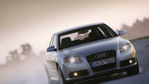 A silver 2005 Audi S4 drifting