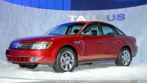 A 2008 Ford Taurus on a showroom floor