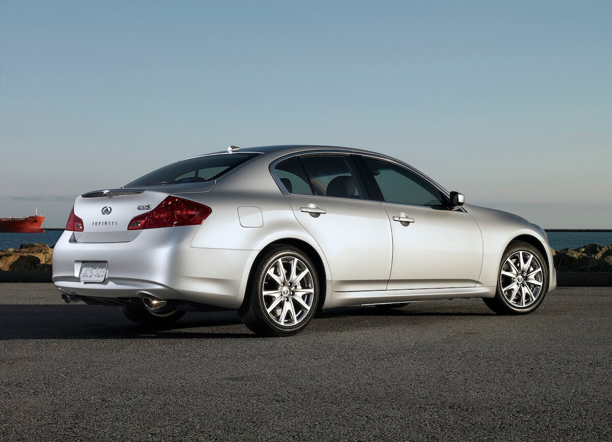 A rear corner view of a silver Infiniti G37 sedan, a car that can be considered a good sleeper car