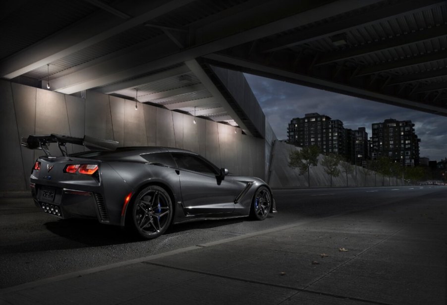 A gray 2019 Chevy Corvette ZR1 shows off its ZTK wing under an overpass.