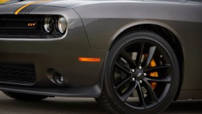 A gray Challenger shows off its black wheels, which, along with AWD, makes it one of the best road trip cars in the segment.