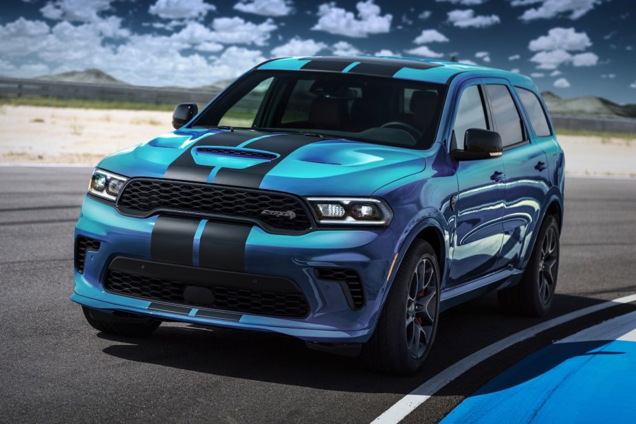 Dodge Durango SRT Hellcat in Frostbite blue on a race track.