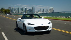 A front view of a 2023 Mazda MX-5 Miata driving