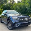 A front corner view of the 2023 Mercedes-Benz GLC 300 at a park