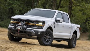 The 2024 Ford F-150 Tremor off-roading in dirt