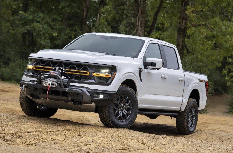 The 2024 Ford F-150 Tremor off-roading in dirt