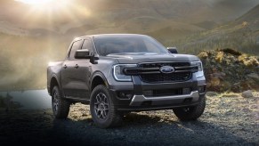 The 2024 Ford Ranger off-roading over rocky terrain