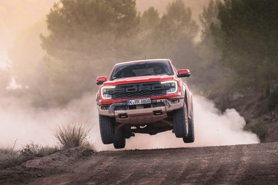 The 2024 Ford Ranger Raptor jumping in the dirt