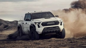 The 2024 Toyota Tacoma off-roading in mud