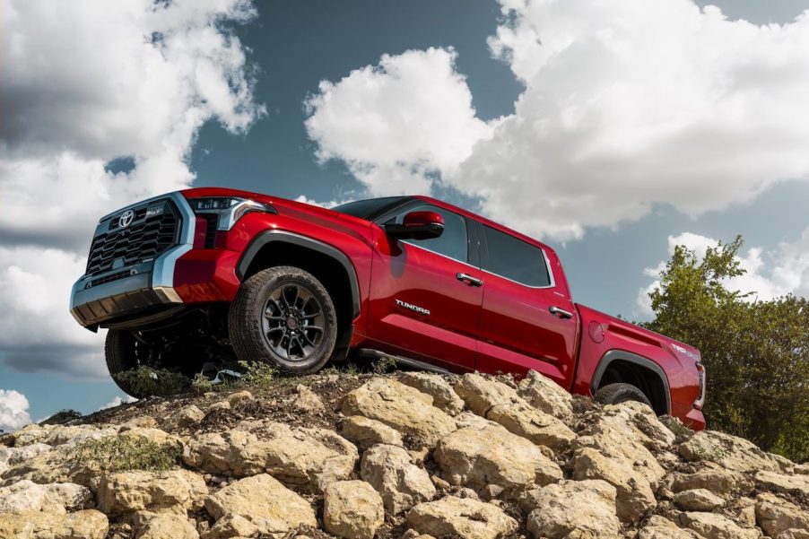 The 2023 Toyota Tundra in red on top of a cliff. The 2024 Toyota Tundra's price can be realistic depending on how you spec it.