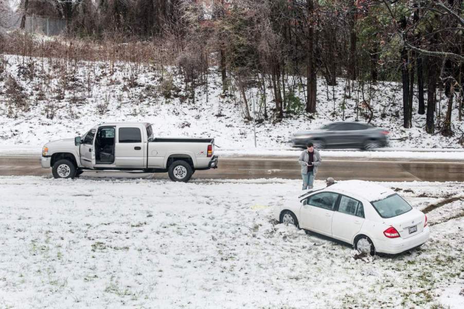 Car sliding off a snowy road