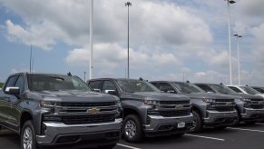 An Ohio lot around Cincinnati or Cleveland shows off its supply of pickup trucks.