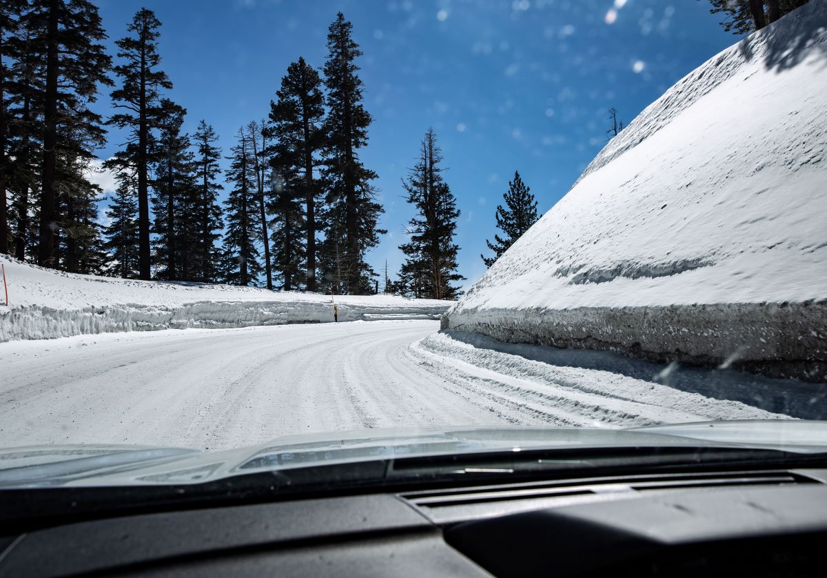 Driving on a snowy road during winter 2023