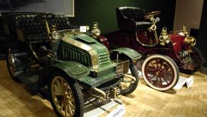 Cadillac's first cars on display at a history museum.