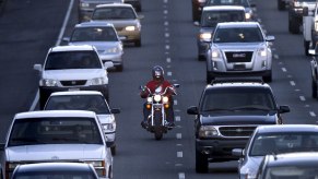 Lone motorcyclist in traffic