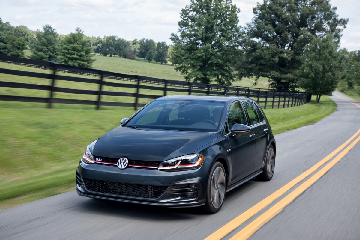 The facelifted MK 7 GTI driving along a road