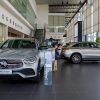 A customer looks at a Mercedes-Benz Group AG GLC 300e Couple vehicle inside the company's showroom in Petaling Jaya, Selangor, Malaysia. The Mercedes-Benz GLC price changes when it's fully equipped.