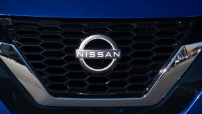 The Nissan badge is seen at the Automobile Barcelona show. Nissan 2023 sales are improving over 2022.