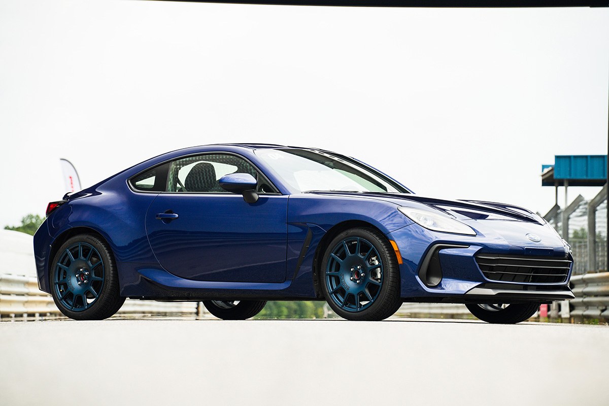 Potenza Sport AS All season tires on 2023 Subaru BRZ at Atlanta Motorsports Park side profile view under sign