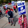 UAW workers striking against Ford, GM, and Stellantis for better pay among record high profits