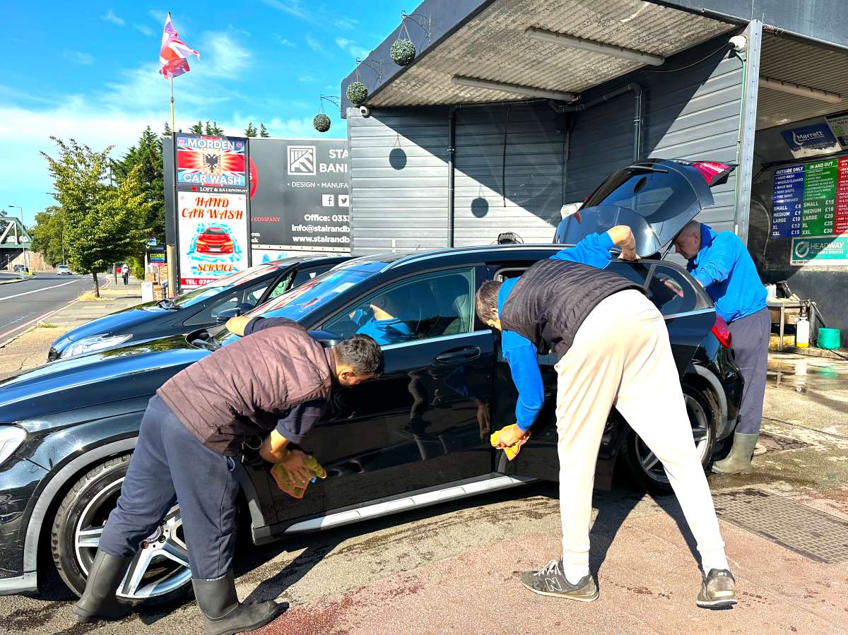 A hand-applied car wax job