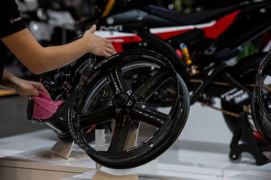 A carbon fiber Motorcycle wheel being polished at the 76th EICMA in Milan, Italy