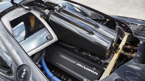 BMW S70/2 V12 engine under the hood of 1994 McLaren F1 engine bay with gold foil liner