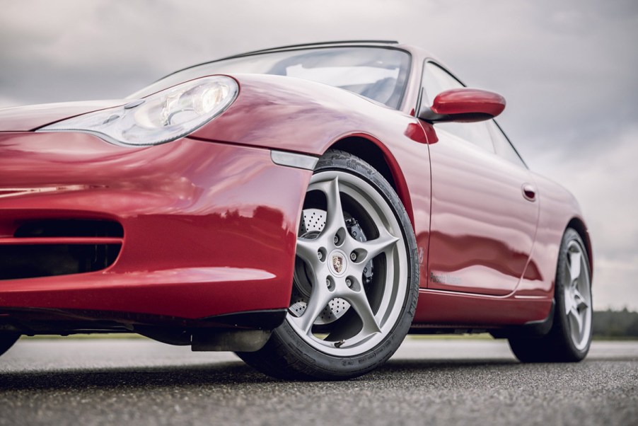 Front 3/4 of a guards red Porsche 996 911 Targa from the Porsche Museum