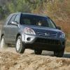 2006 Honda CR-V driving on a dirt road