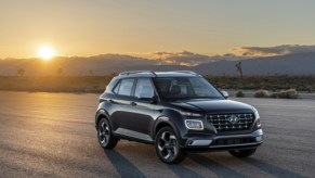 A black 2020 Hyundai Venue subcompact SUV is parked outdoors.