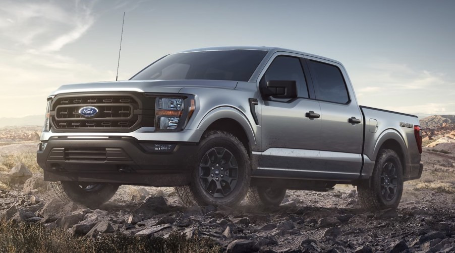 a silver 2023 Ford F-150 Rattler on rocky terrain