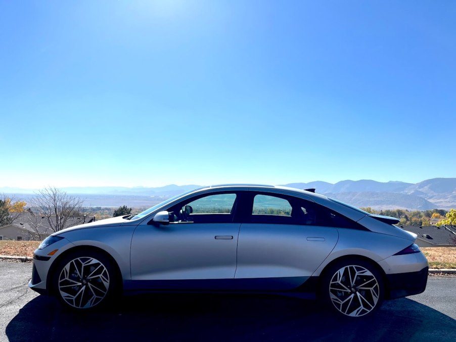 A side view of the 2023 Hyundai Ioniq 6 with a valley back drop