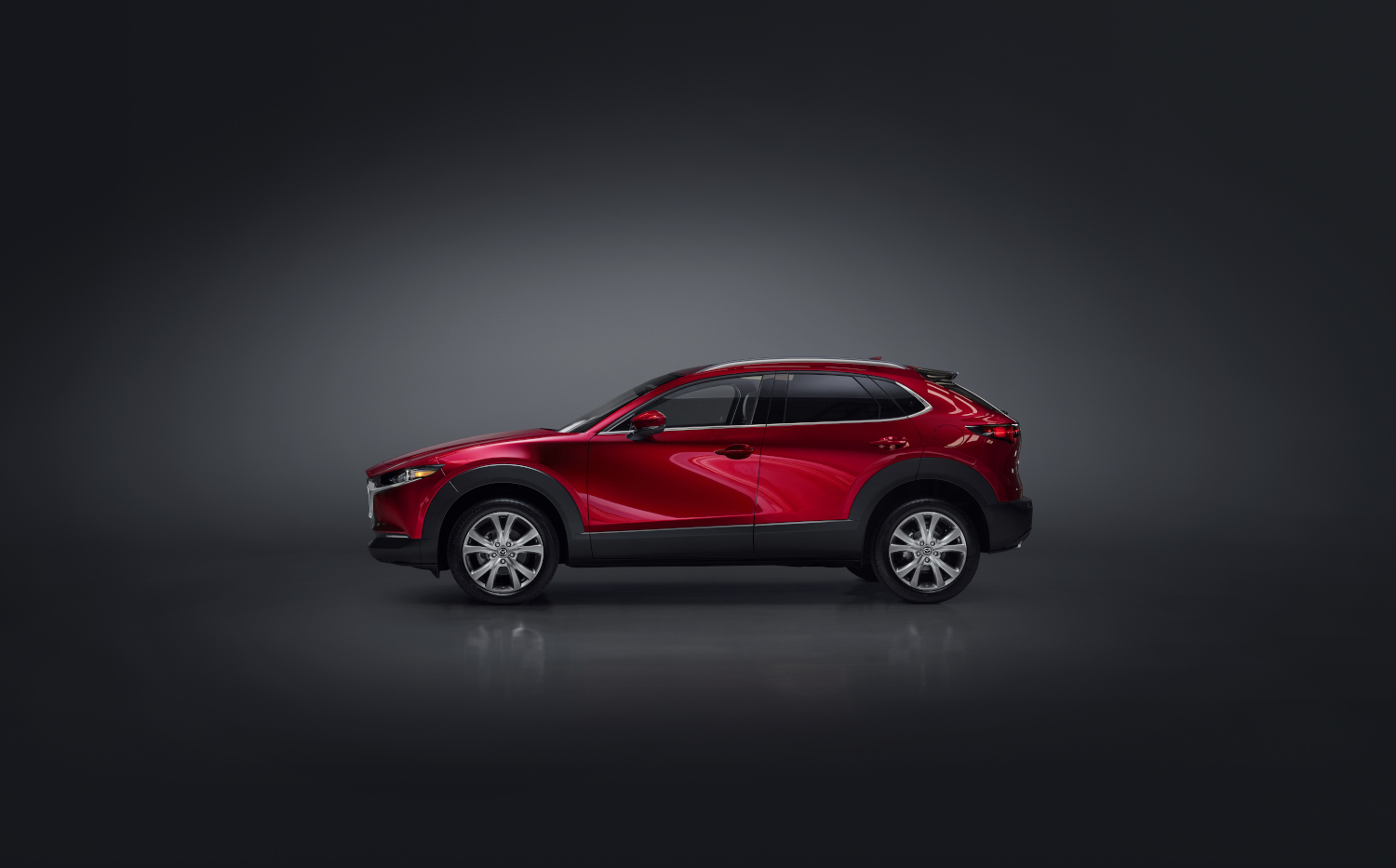 The 2023 Mazda CX-30 subcompact SUV in a dark building