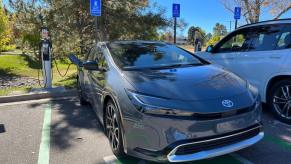 The 2023 Toyota Prius Prime plugged into a charger