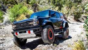 A 2024 Ford Bronco driving off-road.