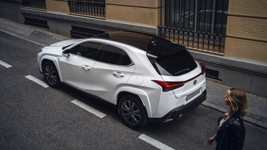 Overhead shot of a white 2024 Lexus UX Hybrid, the cheapest Lexus SUV for 2024.